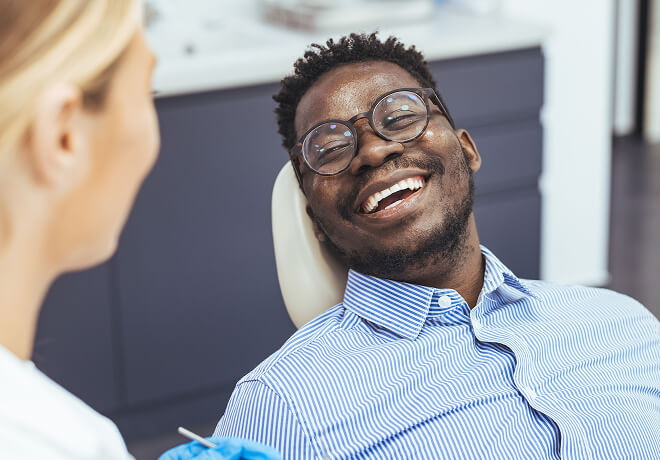 smiling man at the dentist