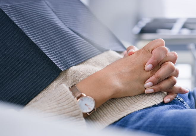 closeup on hands of person at the dentist